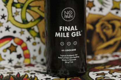 A close-up of a product bottle labeled "Final Mile Gel™" from No Pain Tattoo LLC shows details of "4% Lidocaine" and "Topical Analgesic Gel - Relief of Pain and Swelling - Works in Seconds - 30g | 1oz." The background features colorful, abstract designs, emphasizing the promise of instant relief provided by Final Mile Gel™.